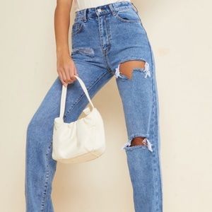 Blue denim straight leg split hem distressed jeans